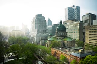 Sun streams into downtown Montreal after a rain storm passes through