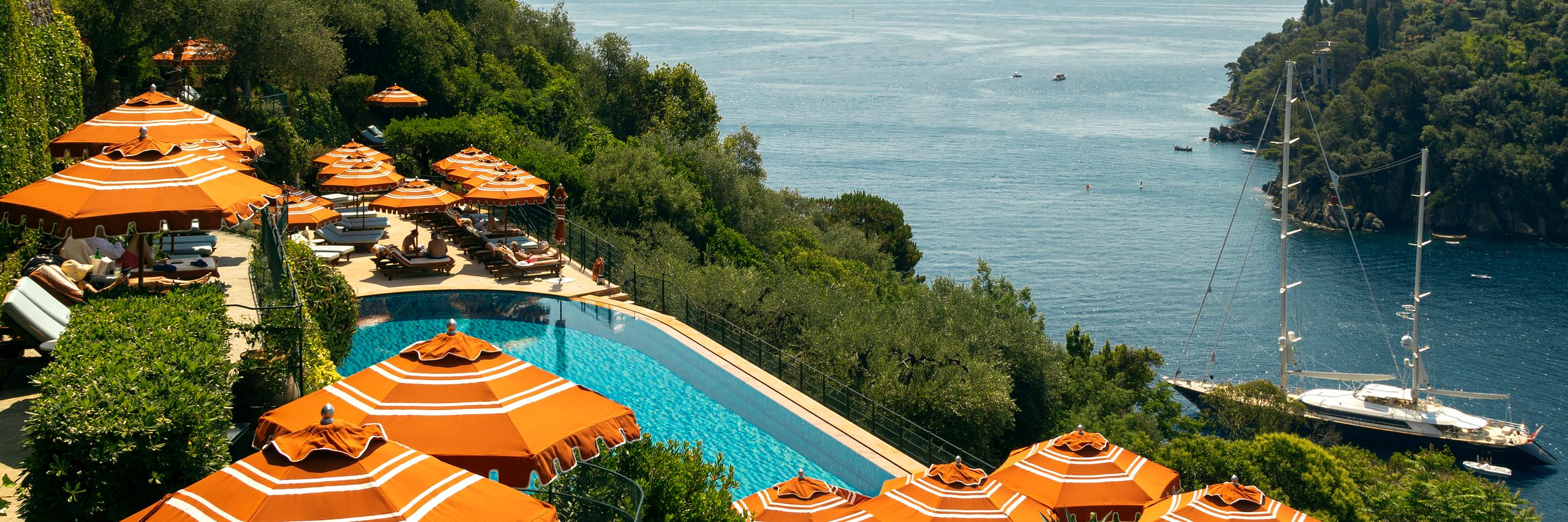 Image may contain Nature Outdoors Scenery Pool Swimming Pool Water Summer Boat Transportation Vehicle and Sea