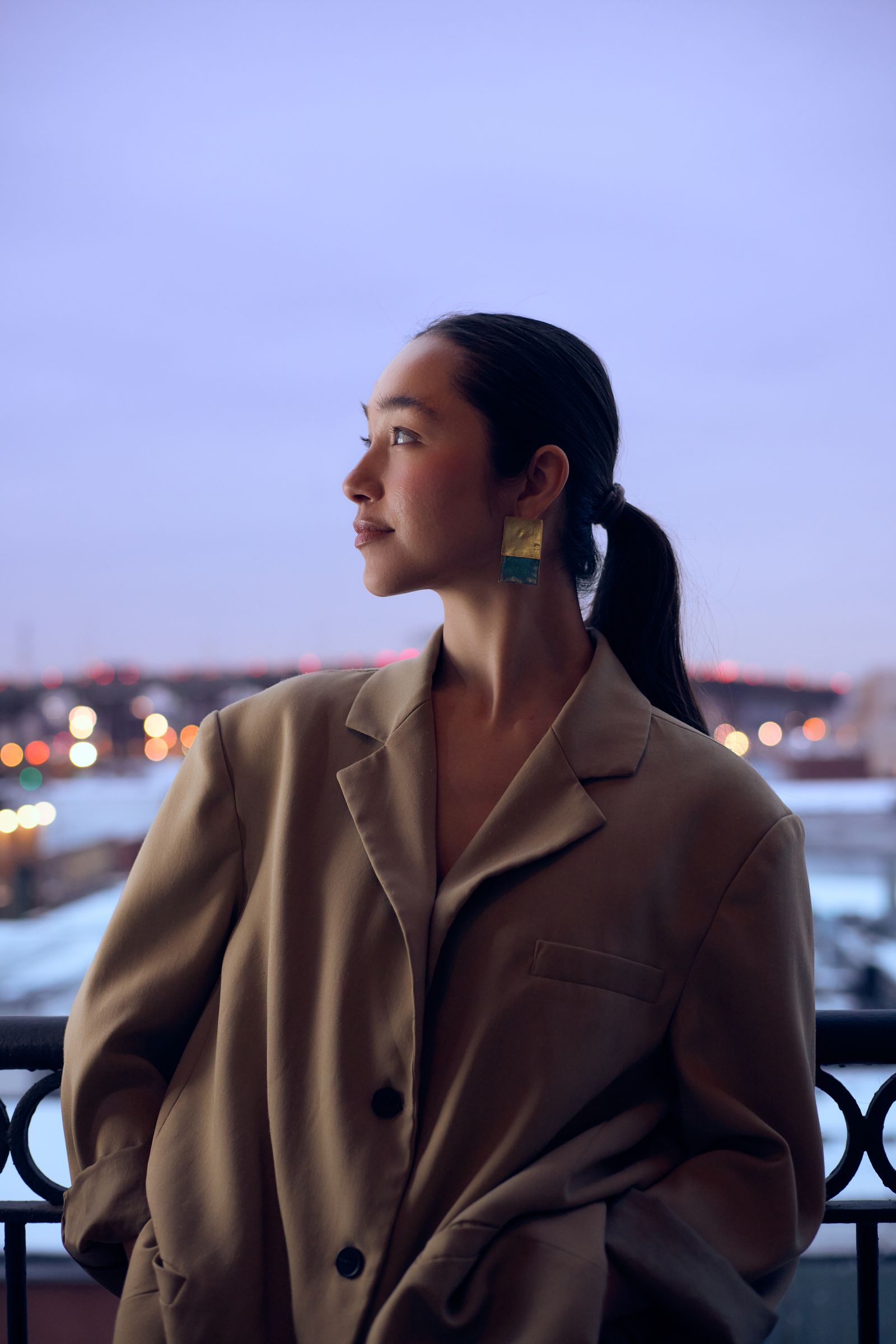 Image may contain Clothing Coat Jacket Face Head Person Photography Portrait Blazer Adult and Overcoat