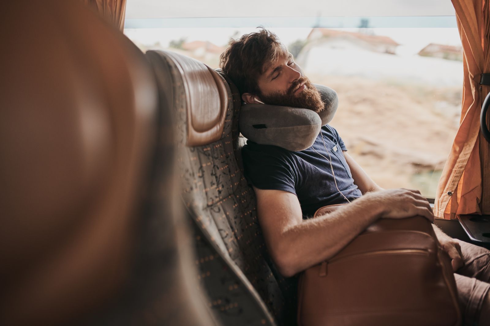 The Best Travel Pillows for Long-Haul Flights, According to Our Editors